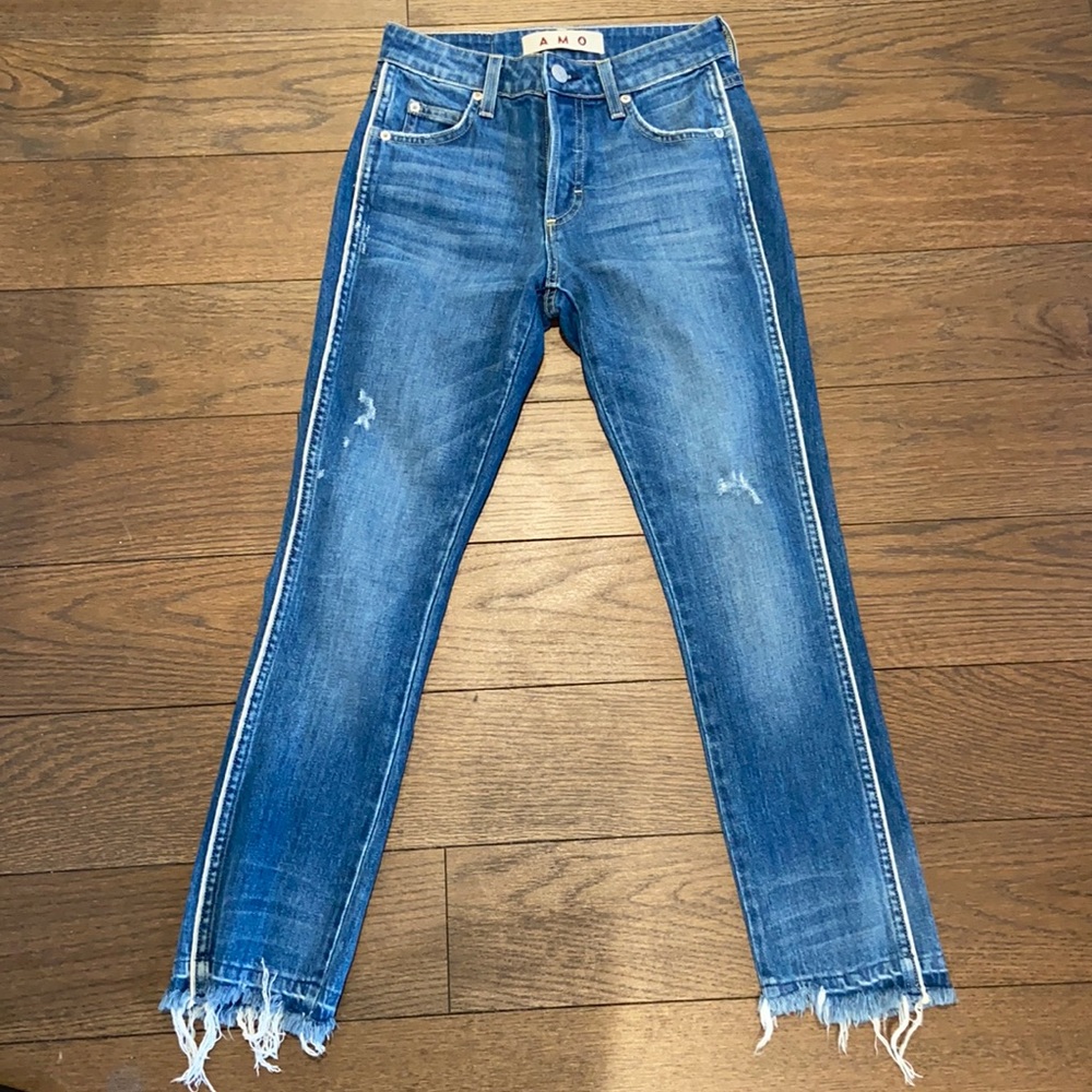 Amo jeans with distressed bottoms